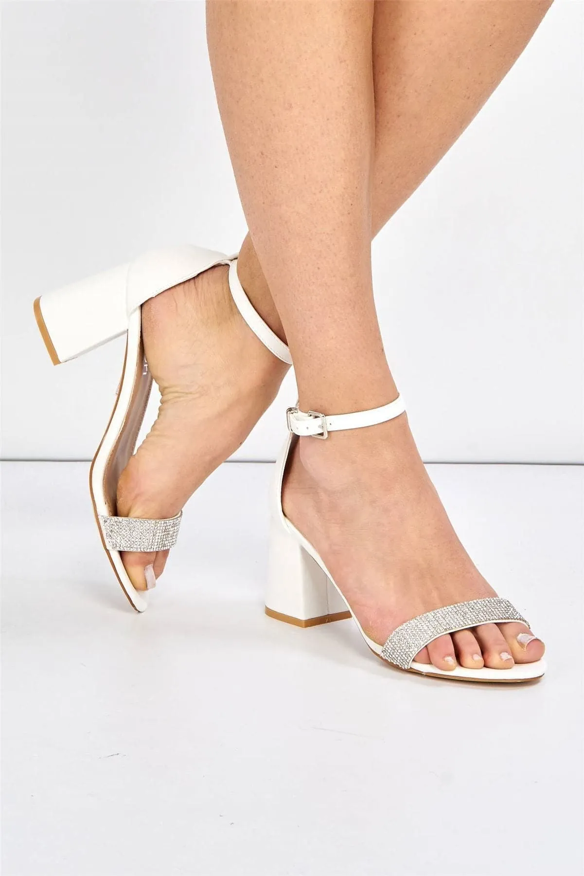 Asti Block Heel Ankle Strap Sandal in White